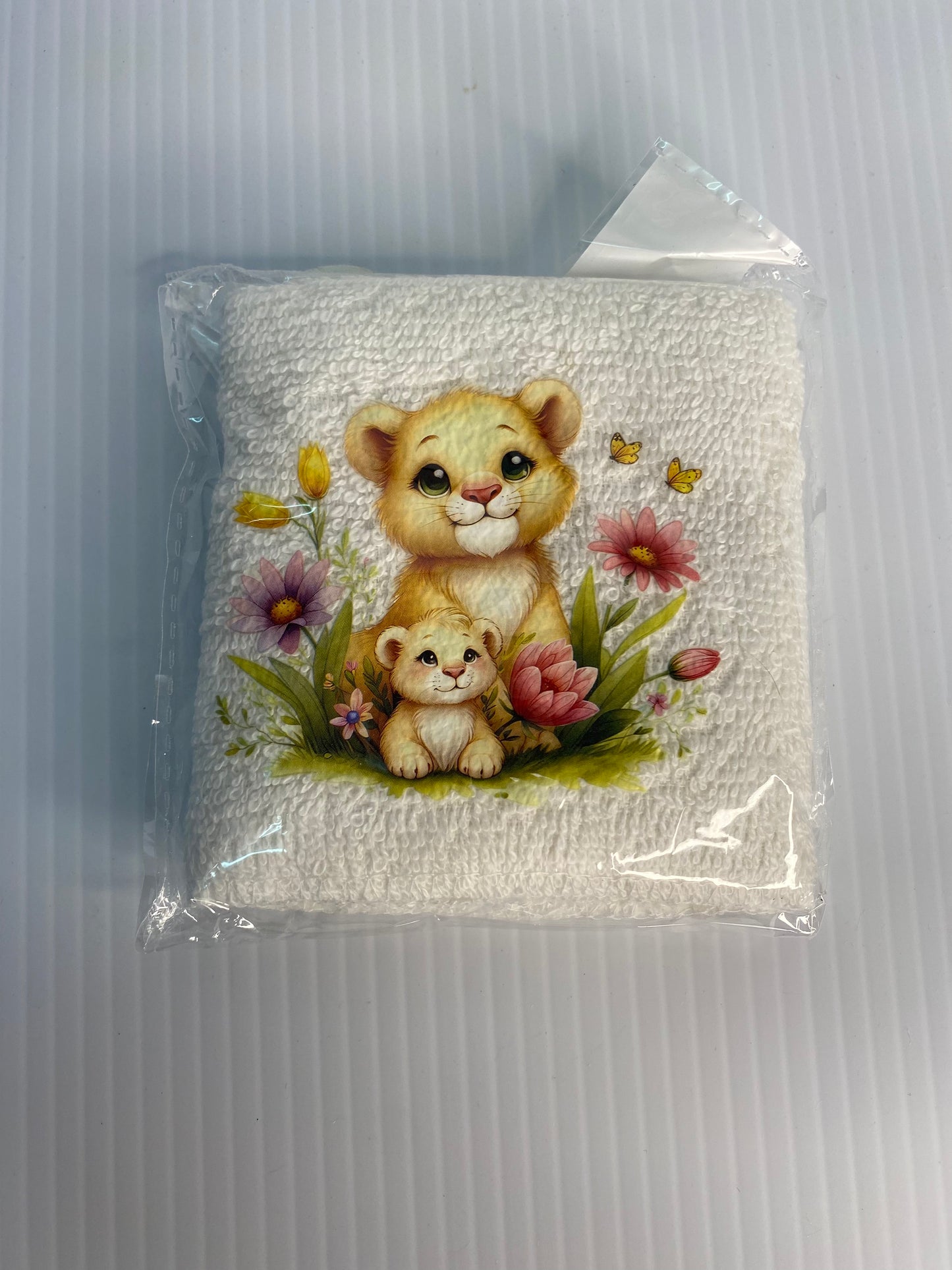 Baby Face Washer Lioness and Cub on a White Washer