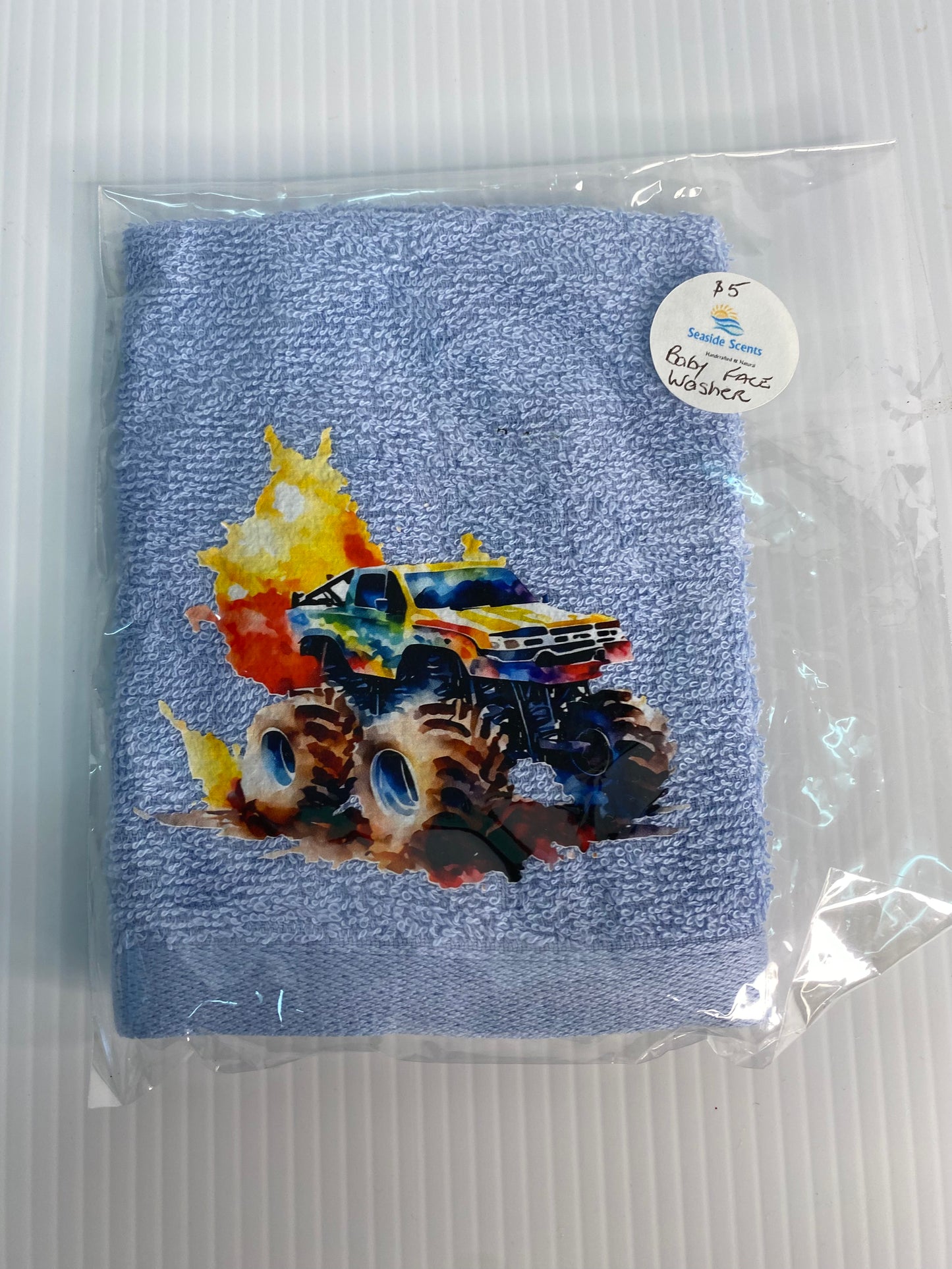 Baby Face Washer- Small Monster Truck on a Blue Washer